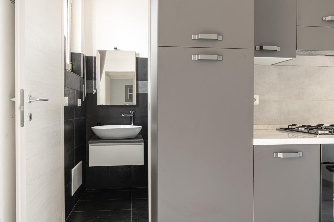 Almi - Guest Apartment Porto Torres Bagian luar foto